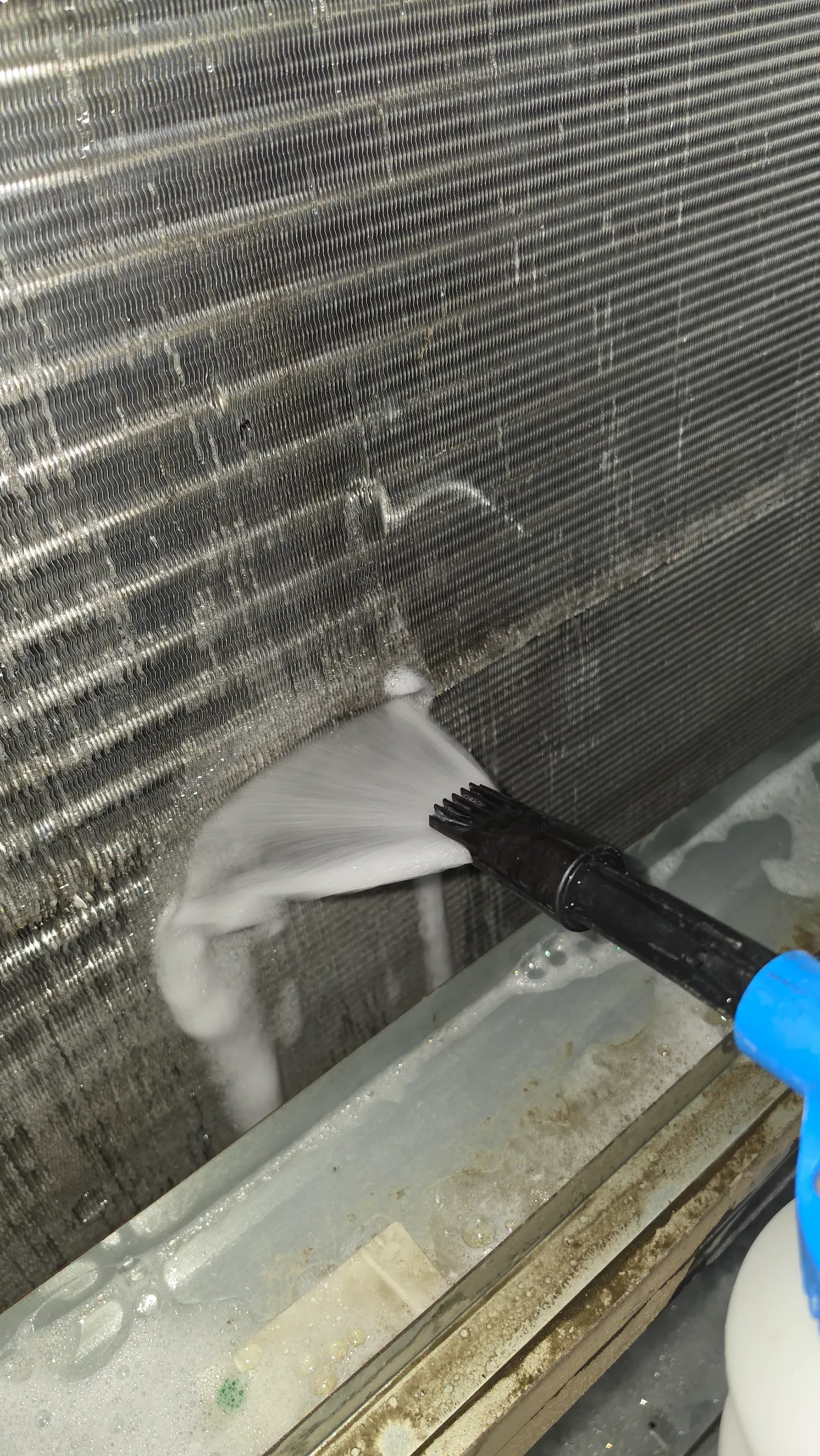 Progress photo showing Acid cleaning evaporator during Commercial HVAC repair in Indian Wells, California