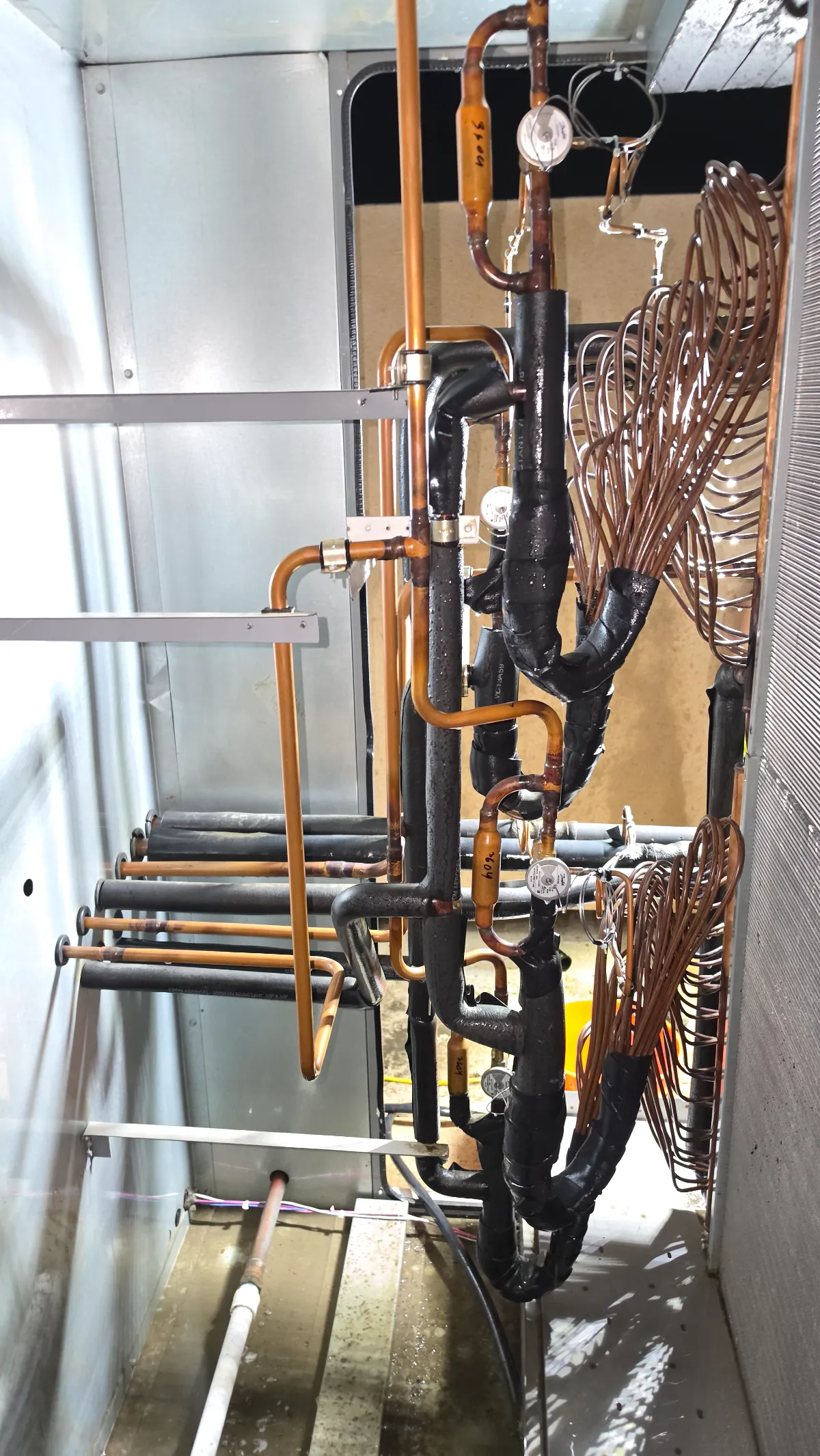 Progress photo showing Clean AC parts during Commercial HVAC repair in Indian Wells, California