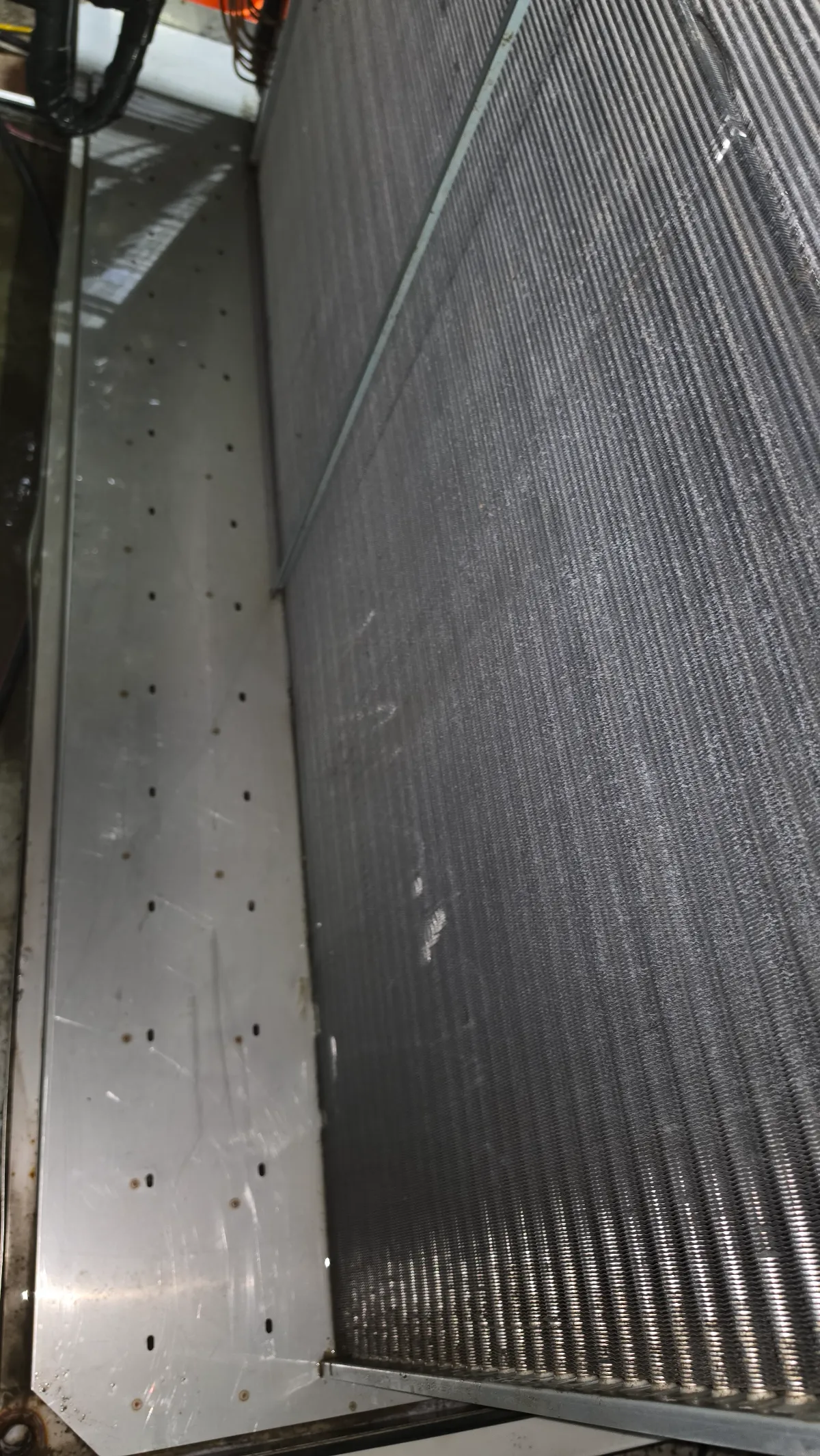 Progress photo showing clean condensate drain during Commercial HVAC repair in Indian Wells, California