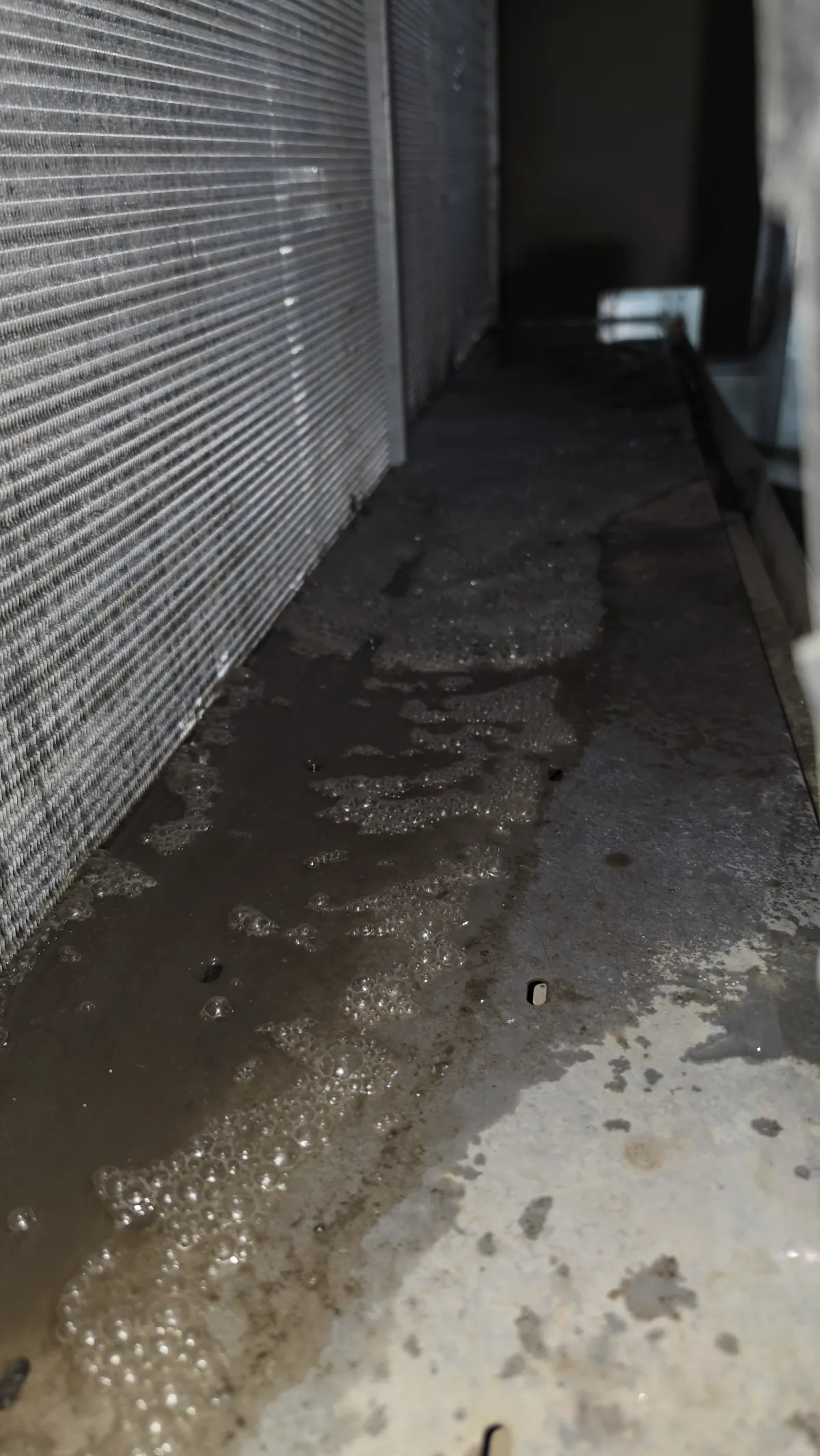 Progress photo showing massive build up from coil during Commercial HVAC repair in Indian Wells, California