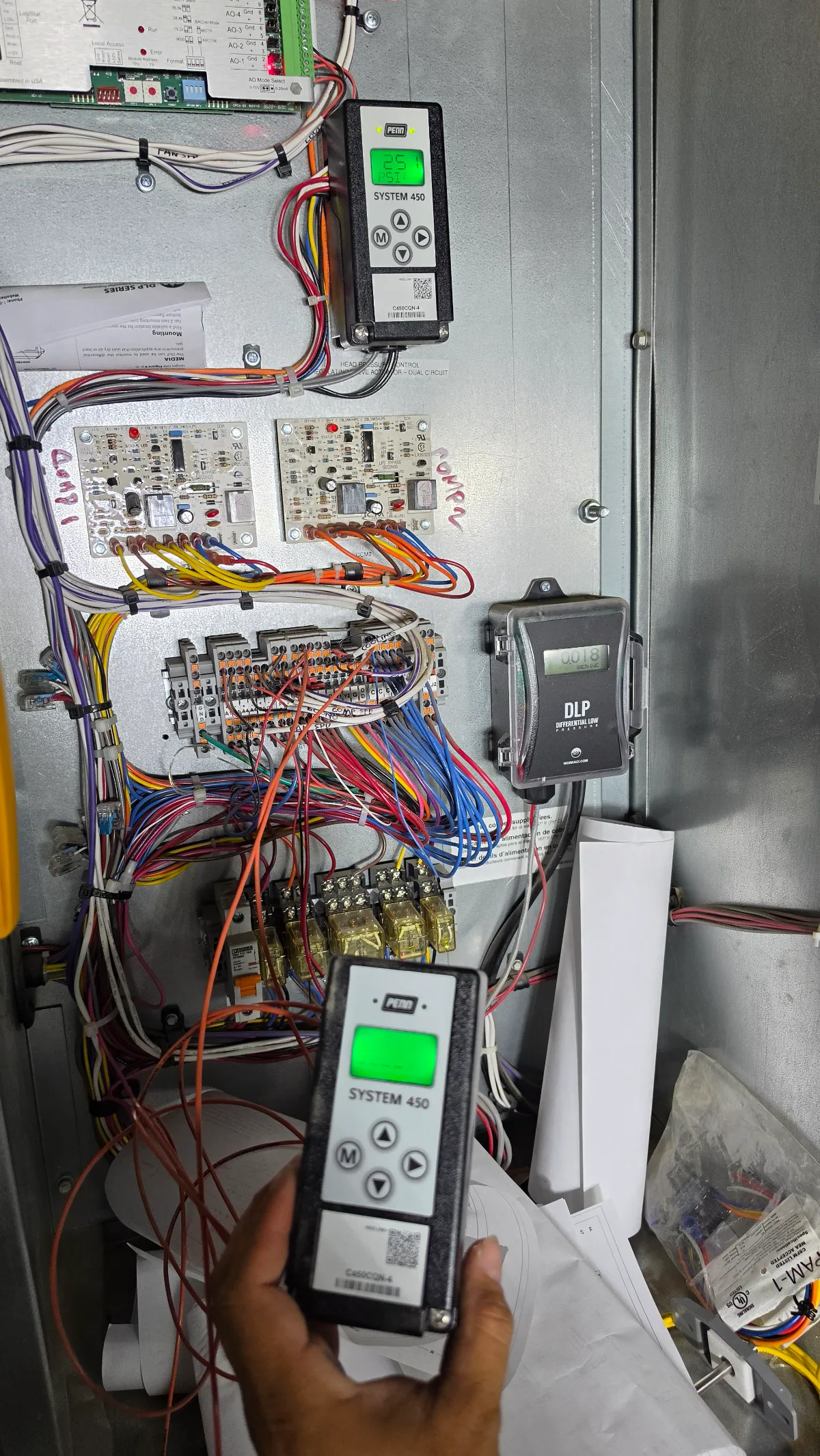 Progress photo showing programming compressor head pressure control during Commercial HVAC repair in Indian Wells, California