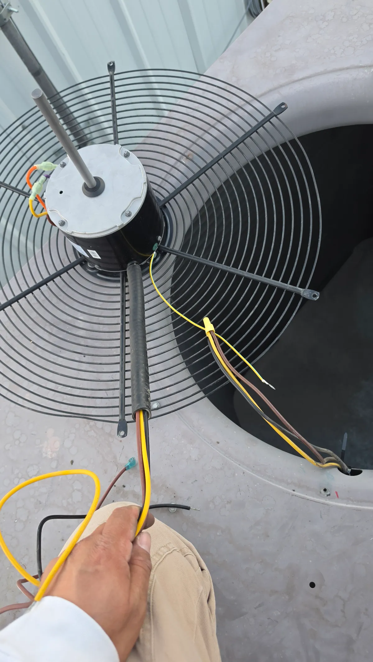 Progress photo showing new Condensing unit motor during Commercial HVAC repair in Palm Springs, California