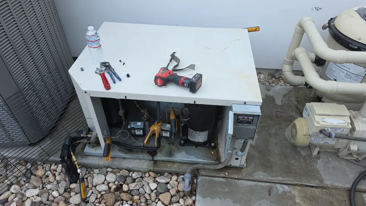 Progress photo showing condensing unit during Residential HVAC maintenance in Indian Wells, California