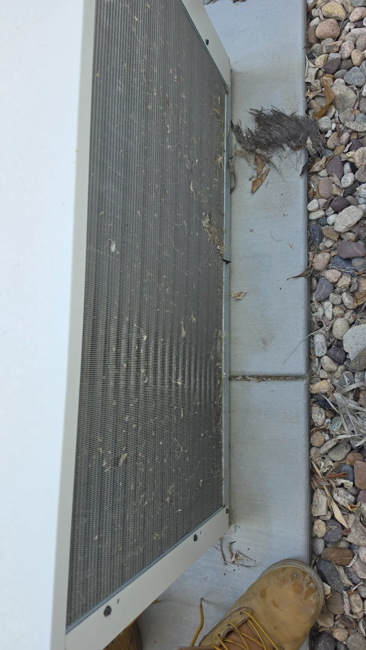 Progress photo showing dirty condensing coil during Residential HVAC maintenance in Indian Wells, California