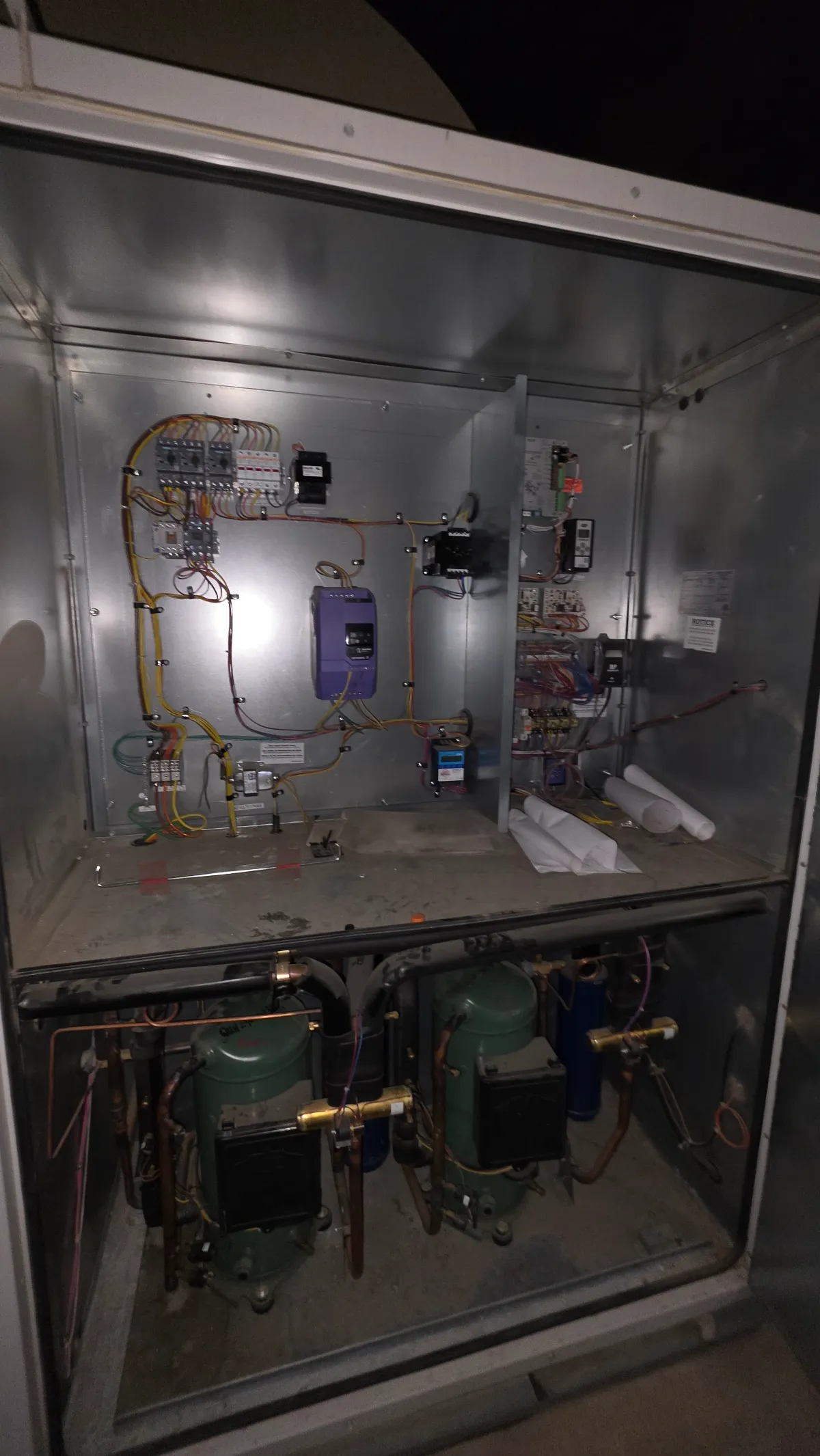Progress photo showing compressor and electrical components during Commercial HVAC service in Indian Wells, California