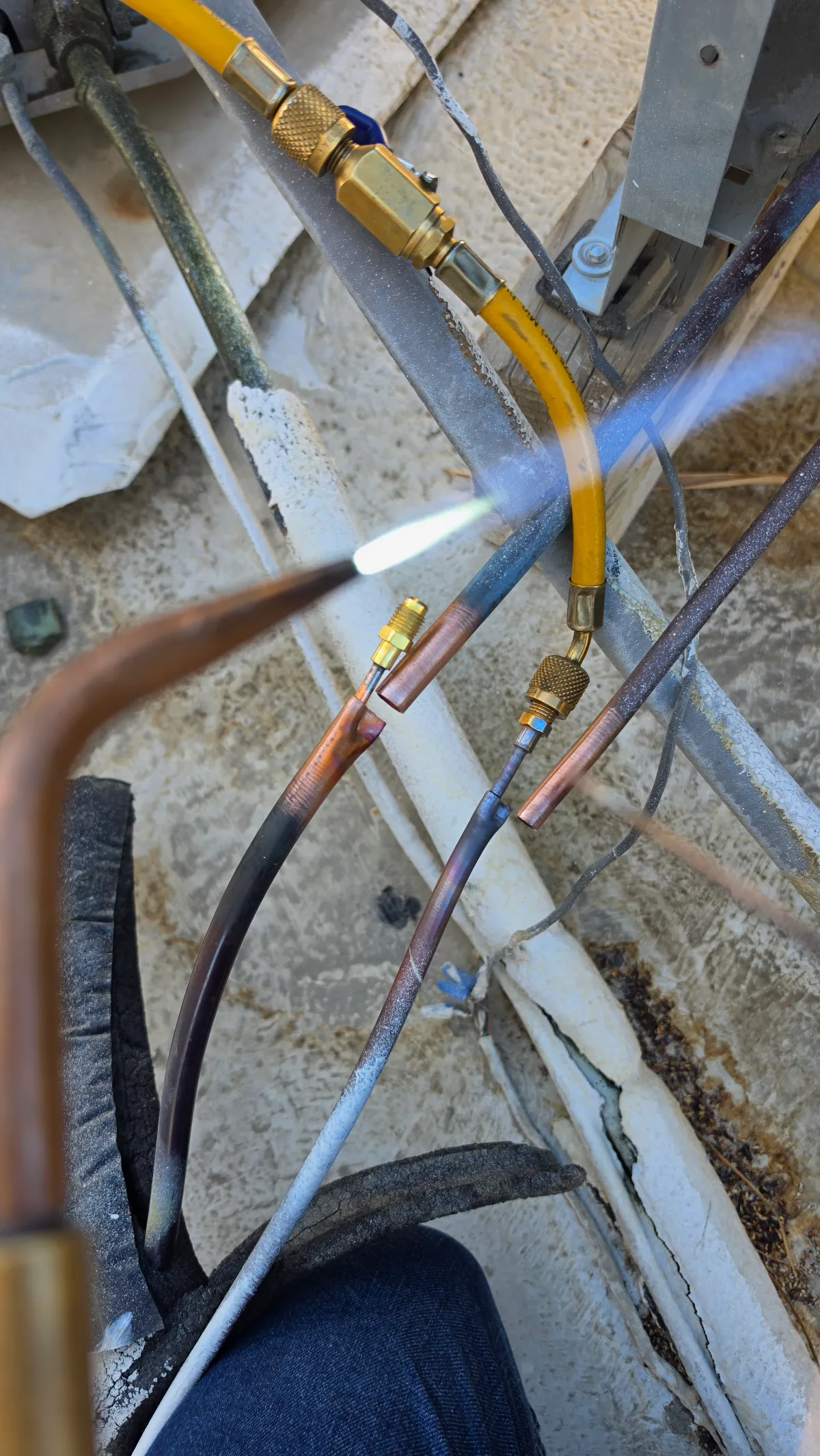 Progress photo showing installing pressure ports during Residential HVAC service in Indian Wells, California