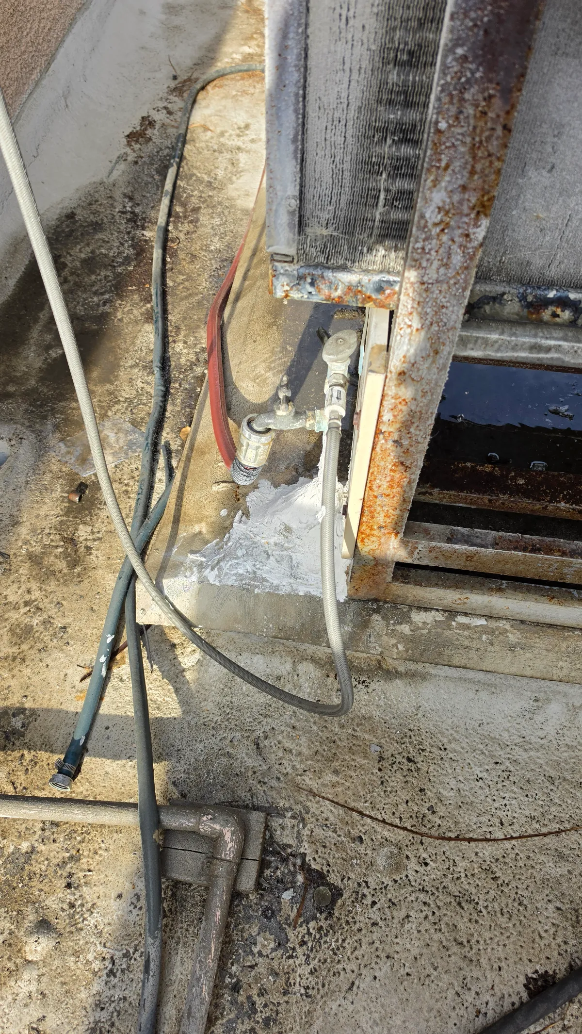 Progress photo showing Water sprayer on coil during Commercial Refrigeration diagnostic in Indian Wells, California
