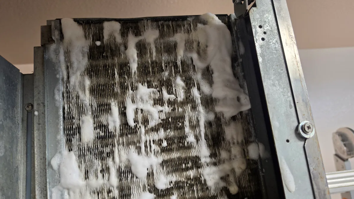 Progress photo showing Condensing unit cleaning during Commercial Refrigeration repair in Indio, California
