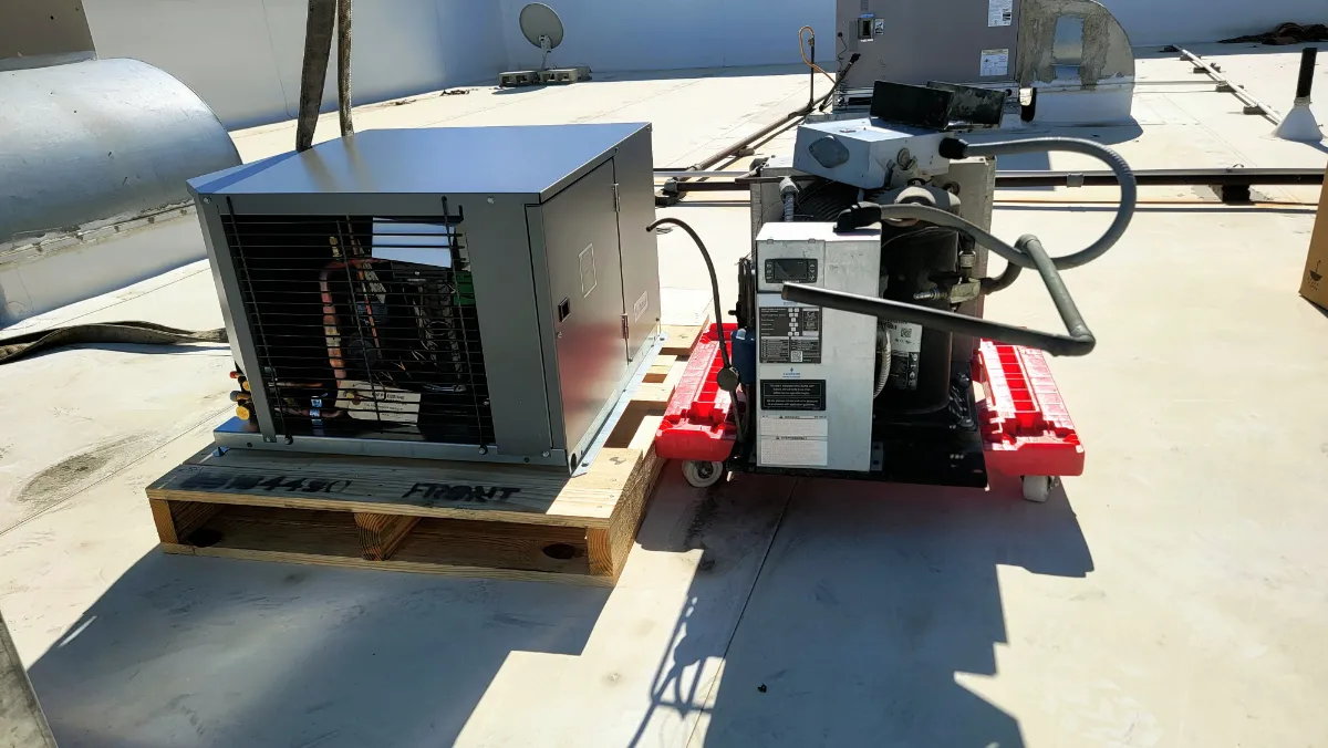 Progress photo showing New condensing unit vs old condensing unit during Commercial Refrigeration installation in Palm Springs, California
