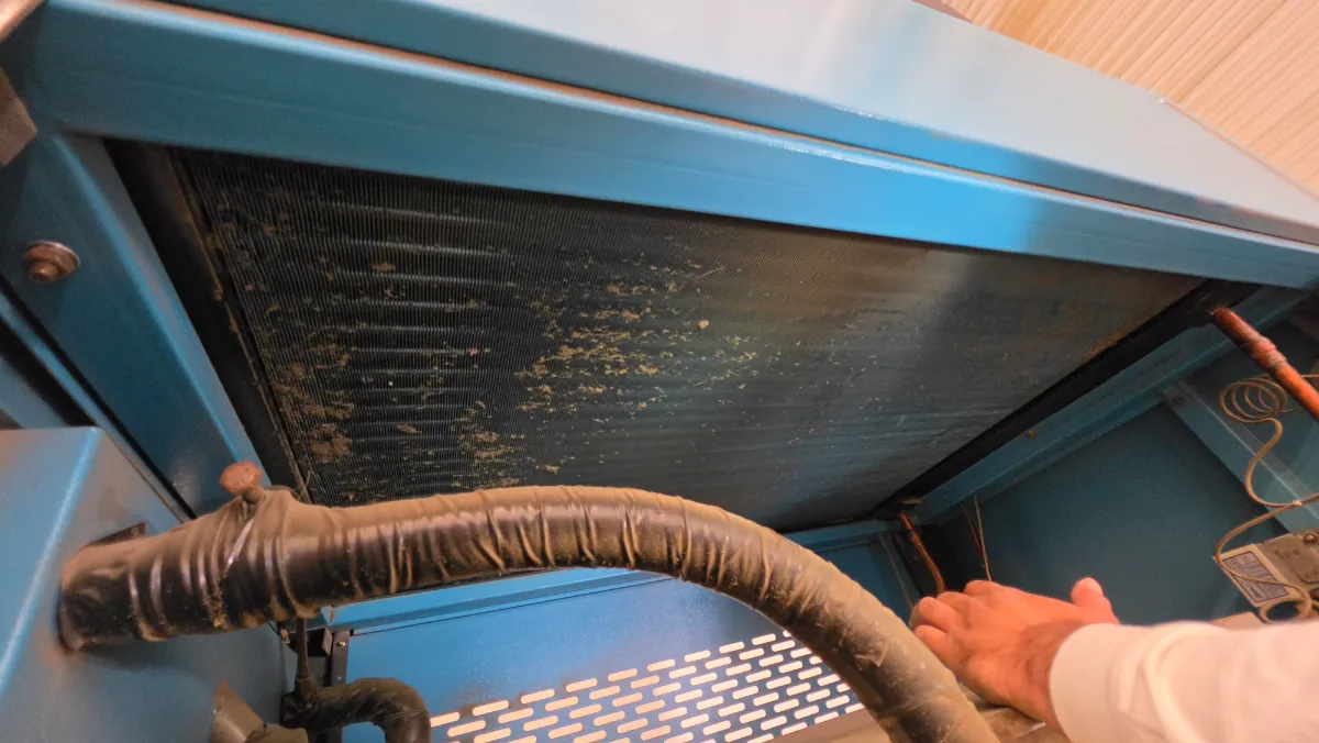 Progress photo showing condensing unit dirty during Commercial HVAC diagnostic in Indio, California