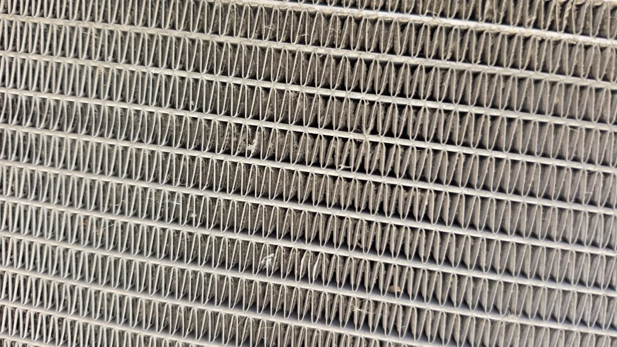 Progress photo showing dirty condensing unit during Commercial Refrigeration service in Indio, California