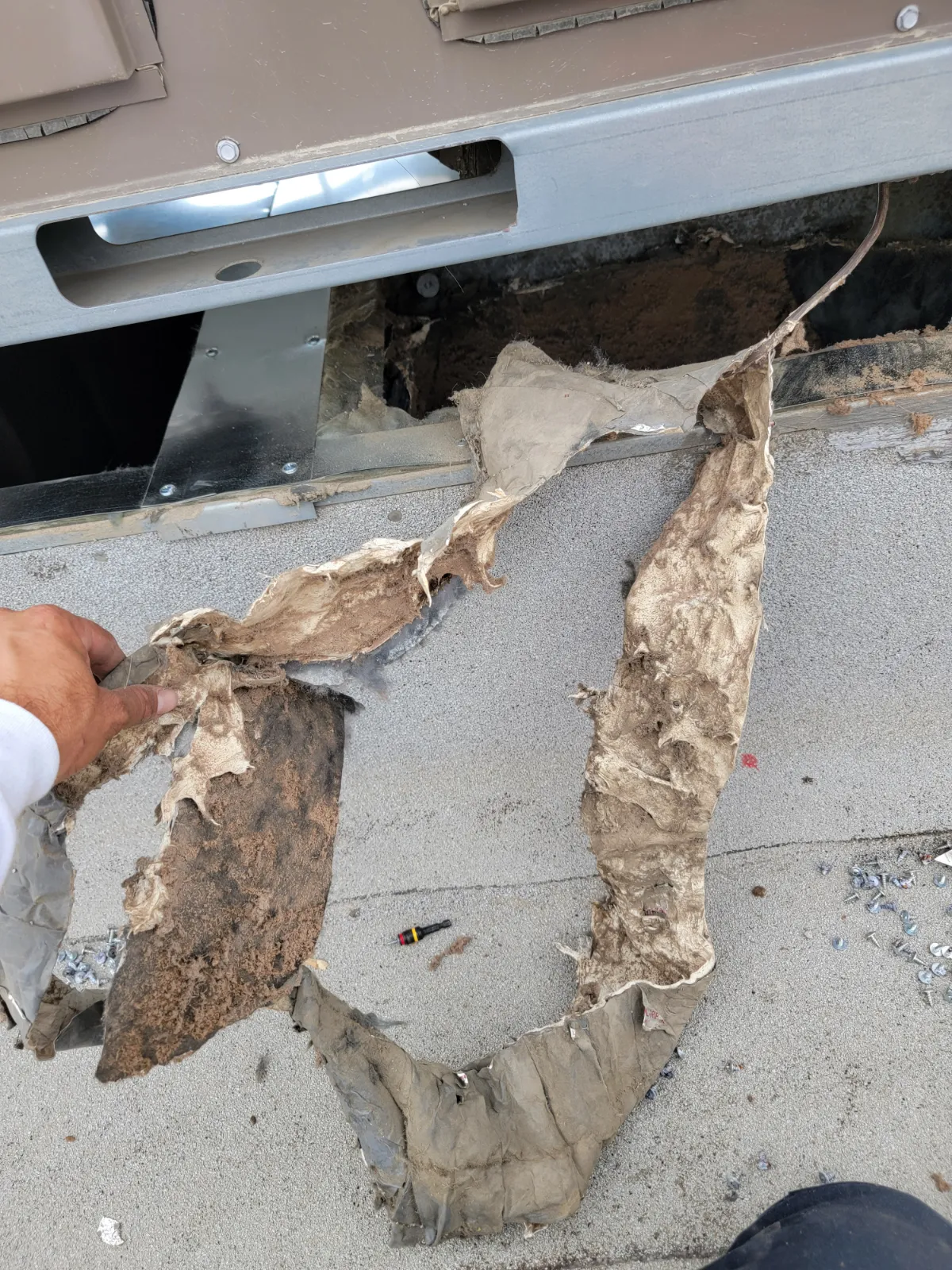 Progress photo showing competitor poor install during Commercial HVAC service in La Quinta, California