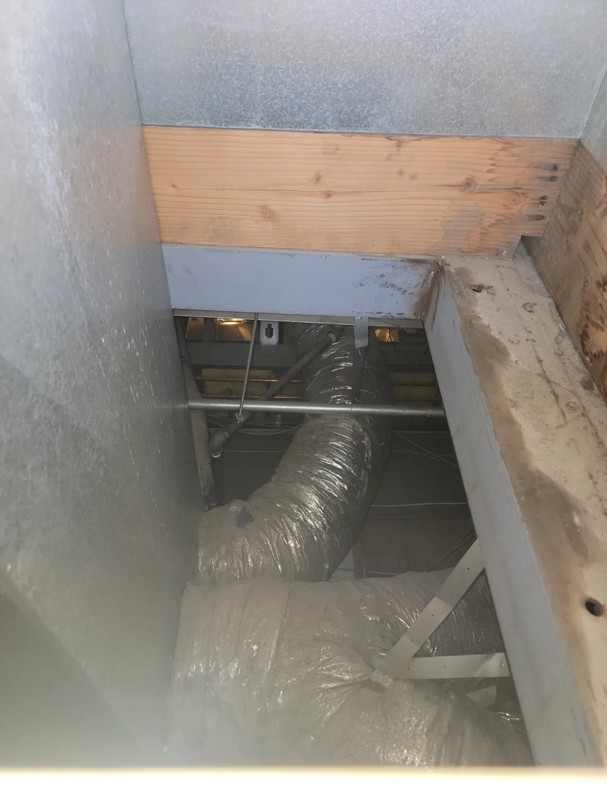 Progress photo showing duct work visible from outside during Commercial HVAC service in La Quinta, California