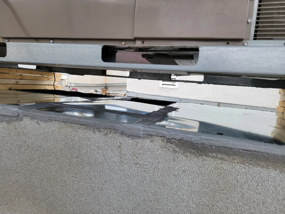Progress photo showing sealed roof curb during Commercial HVAC service in La Quinta, California