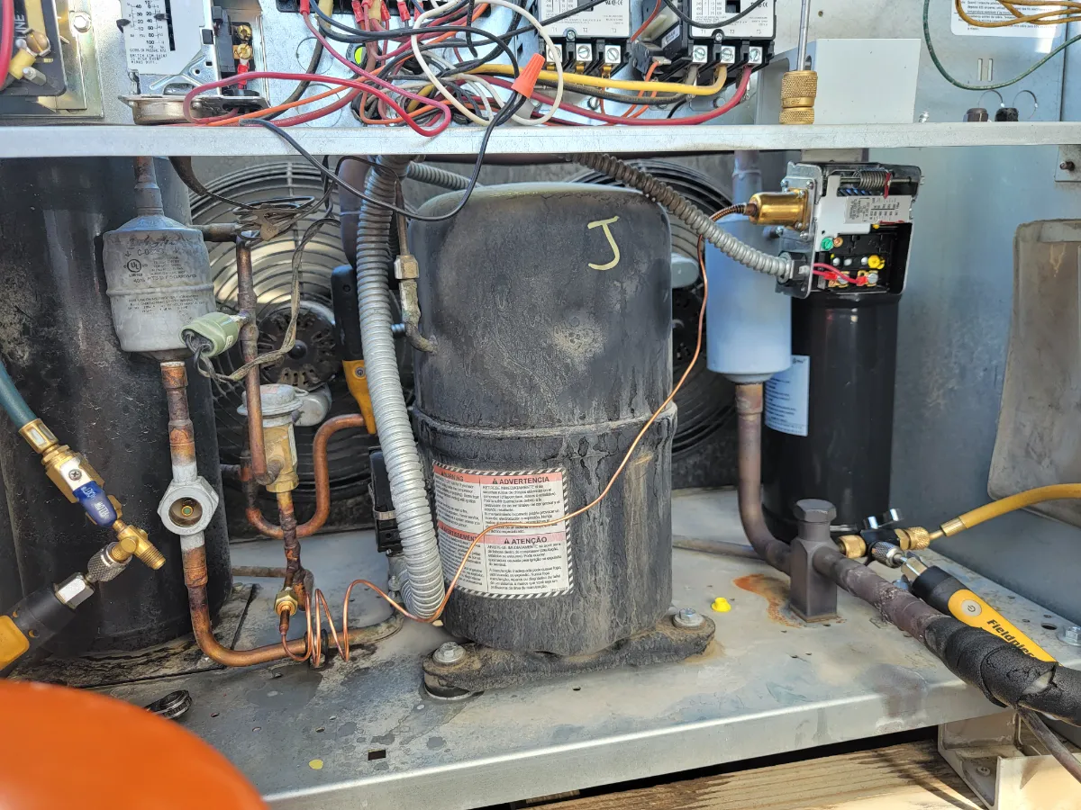 Progress photo showing compressor with new pressure controller during Commercial Refrigeration repair in La Quinta, California