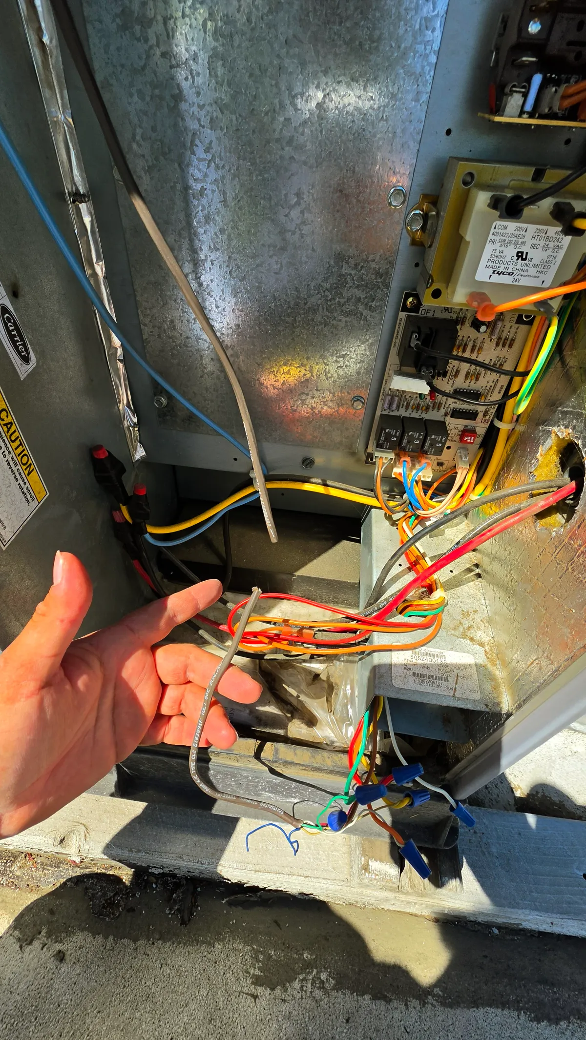 Progress photo showing cut wire during Commercial HVAC repair in Rancho Mirage, California