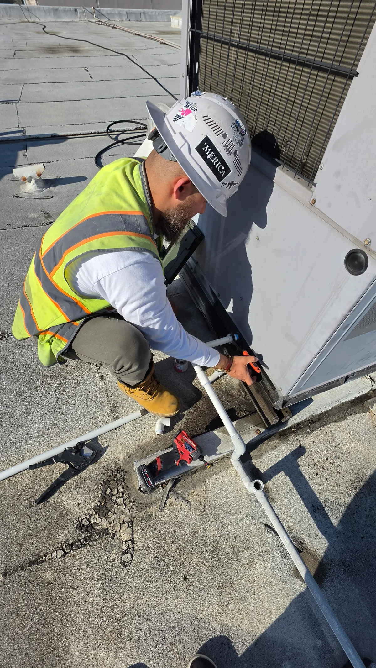Progress photo showing working on pipe during Commercial HVAC repair in Rancho Mirage, California