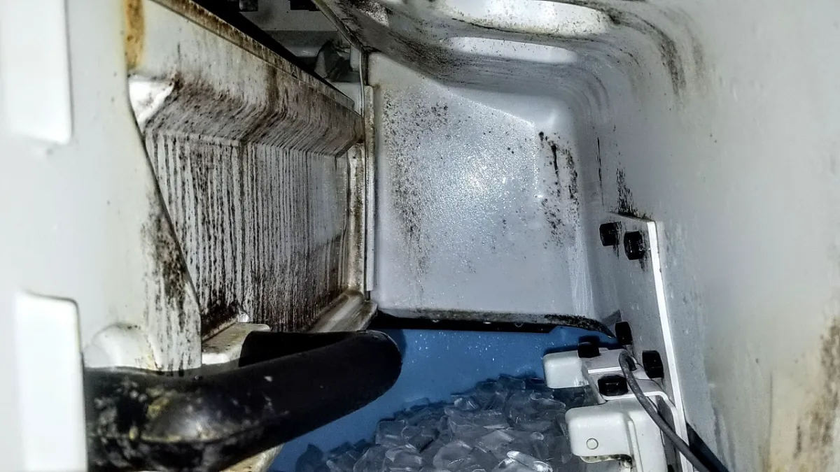 Progress photo showing dirty ice drop during Commercial Refrigeration maintenance in Indio, California