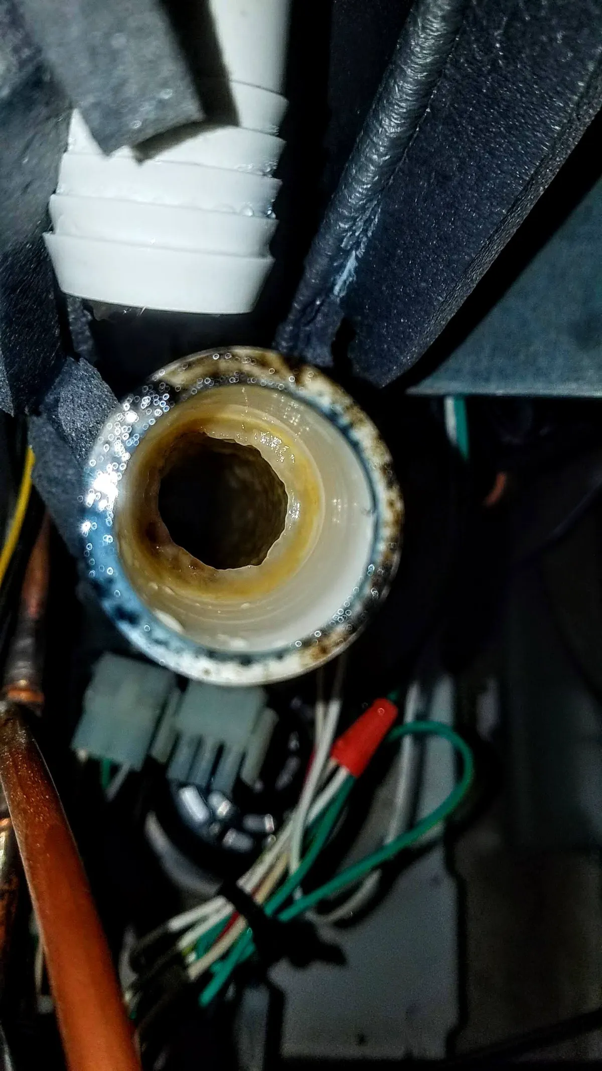 Progress photo showing dirty water hoses during Commercial Refrigeration maintenance in Indio, California