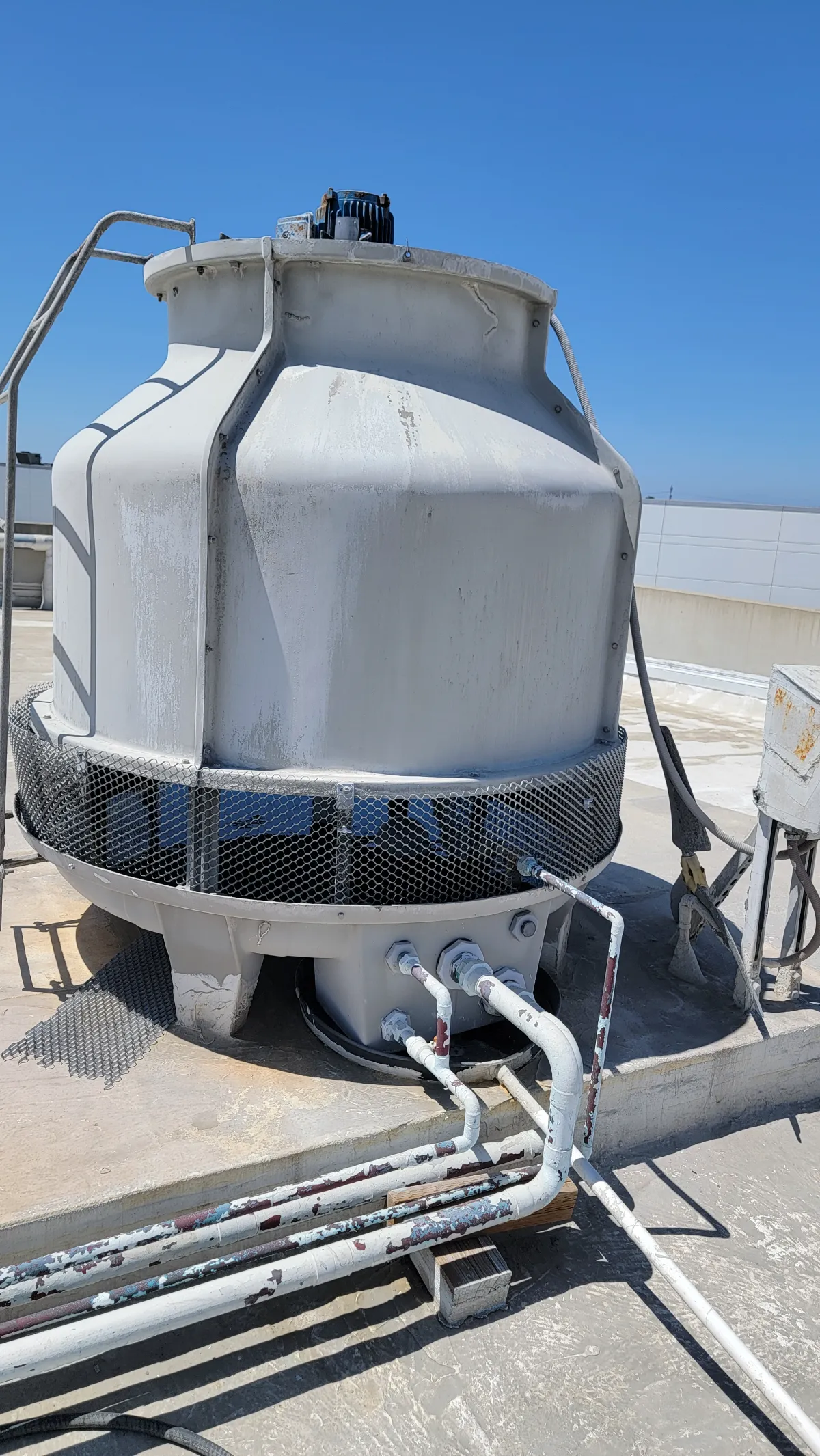 Progress photo showing cooling tower during Commercial HVAC maintenance in Palm Desert, California