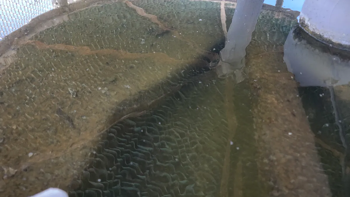Progress photo showing cooling tower reservoir during Commercial HVAC maintenance in Palm Desert, California