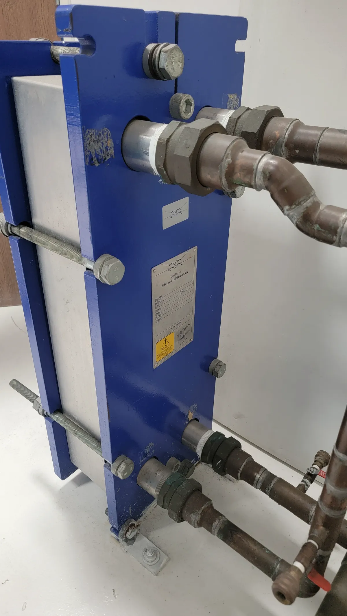 Progress photo showing heat exchanger during Commercial HVAC maintenance in Palm Desert, California