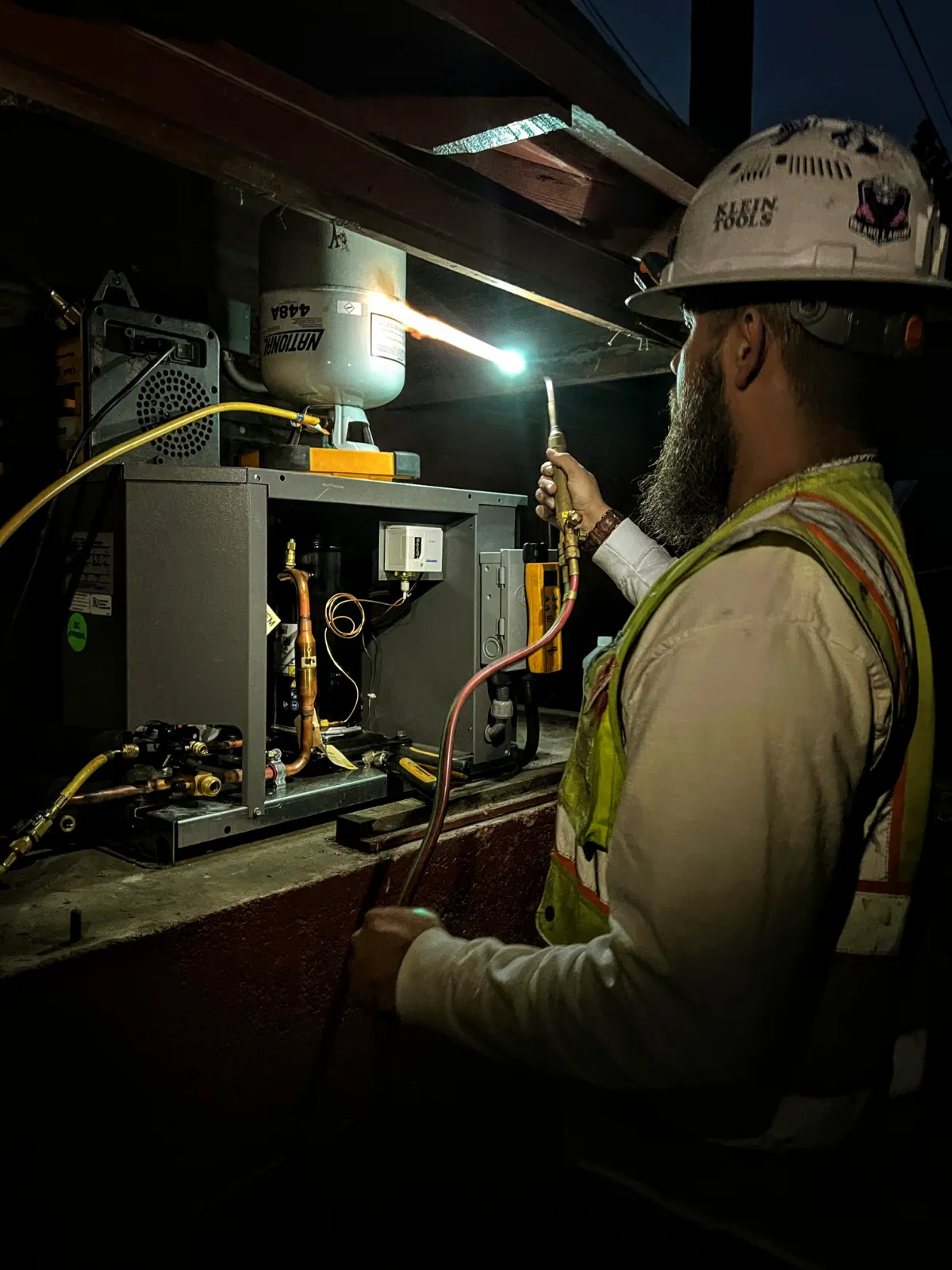 Progress photo showing loading refrigerant in condensing unit during Commercial Refrigeration installation in Palm Desert, California