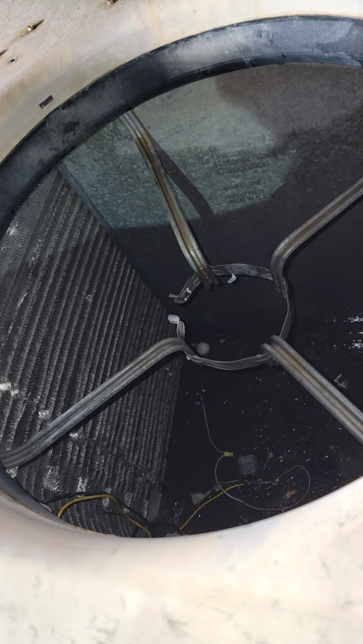 Progress photo showing condensing brakets during Commercial HVAC service in Palm Desert, California