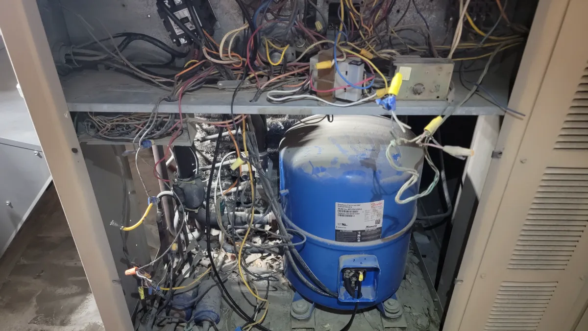 Progress photo showing electrical and compressor compartment during Commercial HVAC service in Palm Desert, California