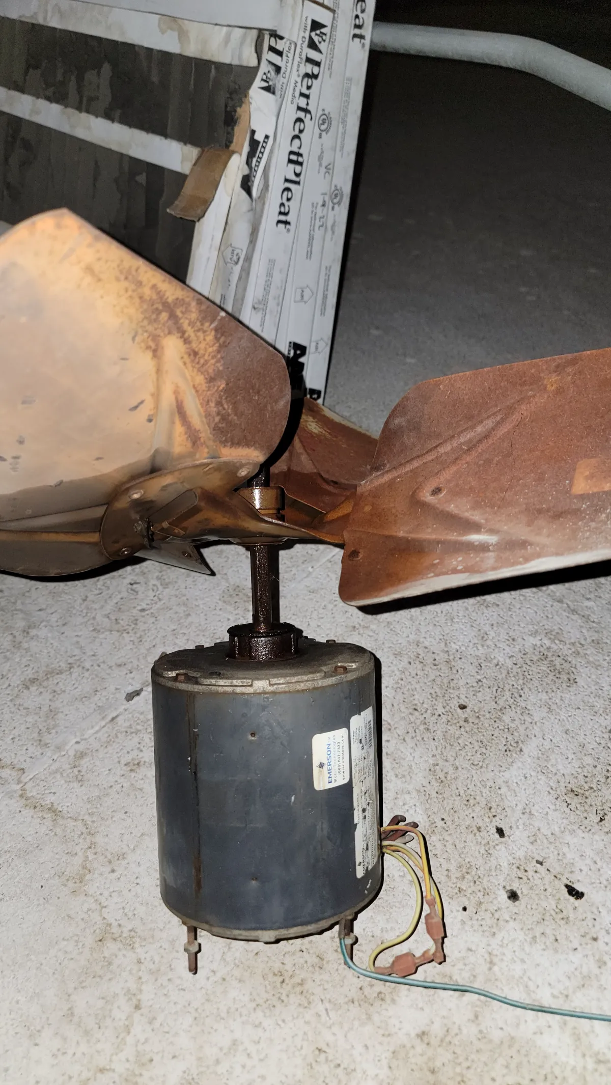 Progress photo showing old condenser motor during Commercial HVAC service in Palm Desert, California